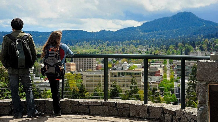 two people view Eugene from Skinner Butte