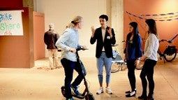 student presentations with scooter